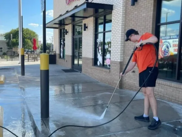 Luxury home with freshly cleaned driveway and yard