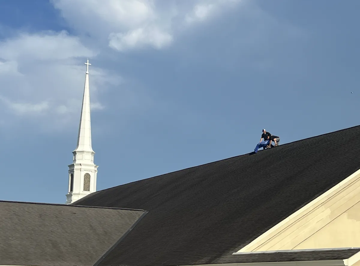 inspecting roof