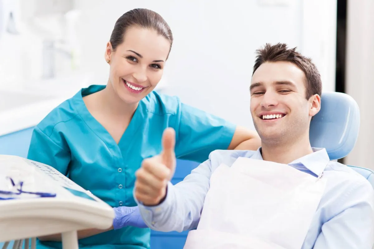 happy-patient-in-dental-chair