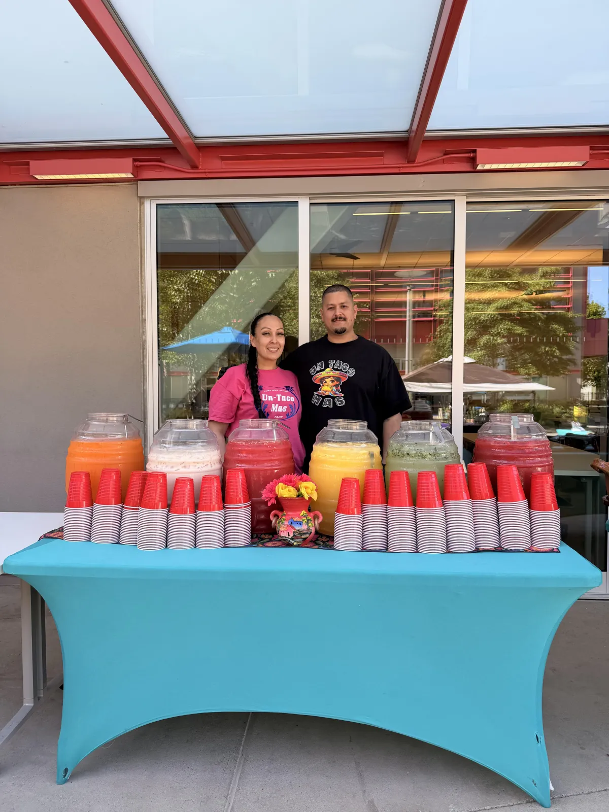 Local catering team setting up an authentic taco spread