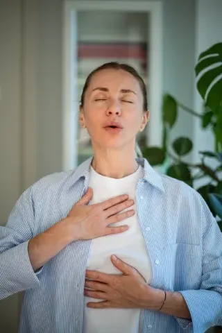 Girl with no smoking sign
