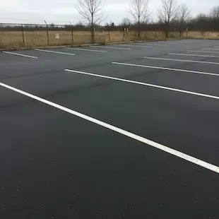 This parking lot was completely repaved and restriped in Bangor, Maine