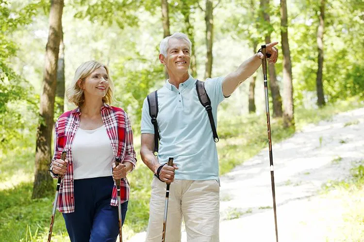 Active couple hiking outdoors after receiving naturopathic treatment for hormonal balance and gender-specific health concerns at Naturopathic Physicians Group in Scottsdale and Phoenix.