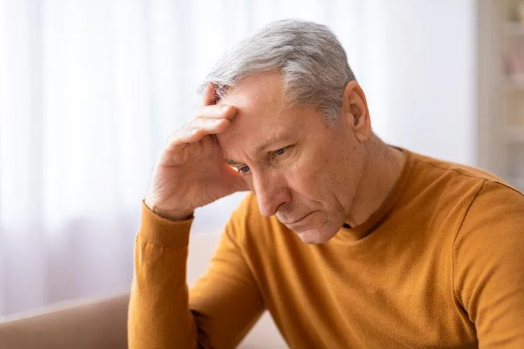 mature man concerned about complexities of mental and cognitive health at Naturopathic Physicians Group in Scottsdale and Phoenix, specializing in personalized care for chronic conditions.