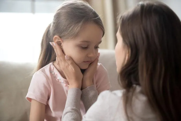 loving mother comforting her child understanding the complexity of children's health   at Naturopathic Physicians Group in Scottsdale and Phoenix.