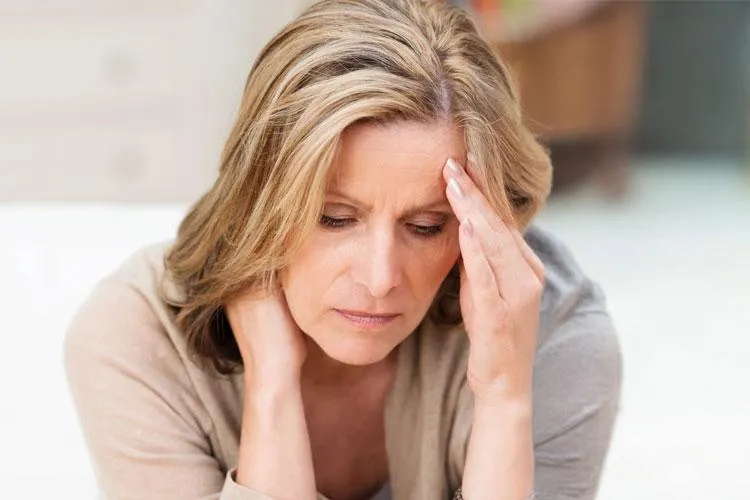 Woman tired of managing symptoms without addressing root causes at Naturopathic Physicians Group in Scottsdale and Phoenix.