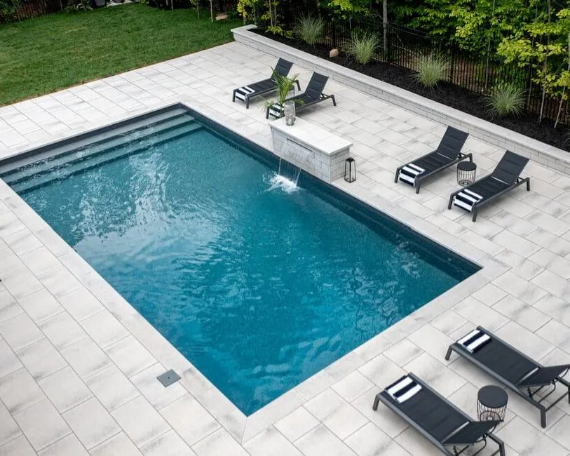 Backyard patio transformation with seating walls in Wheaton, IL.