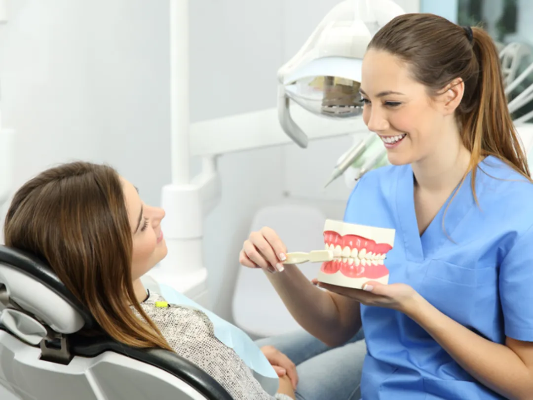 woman with silver and yellow hoop earrings