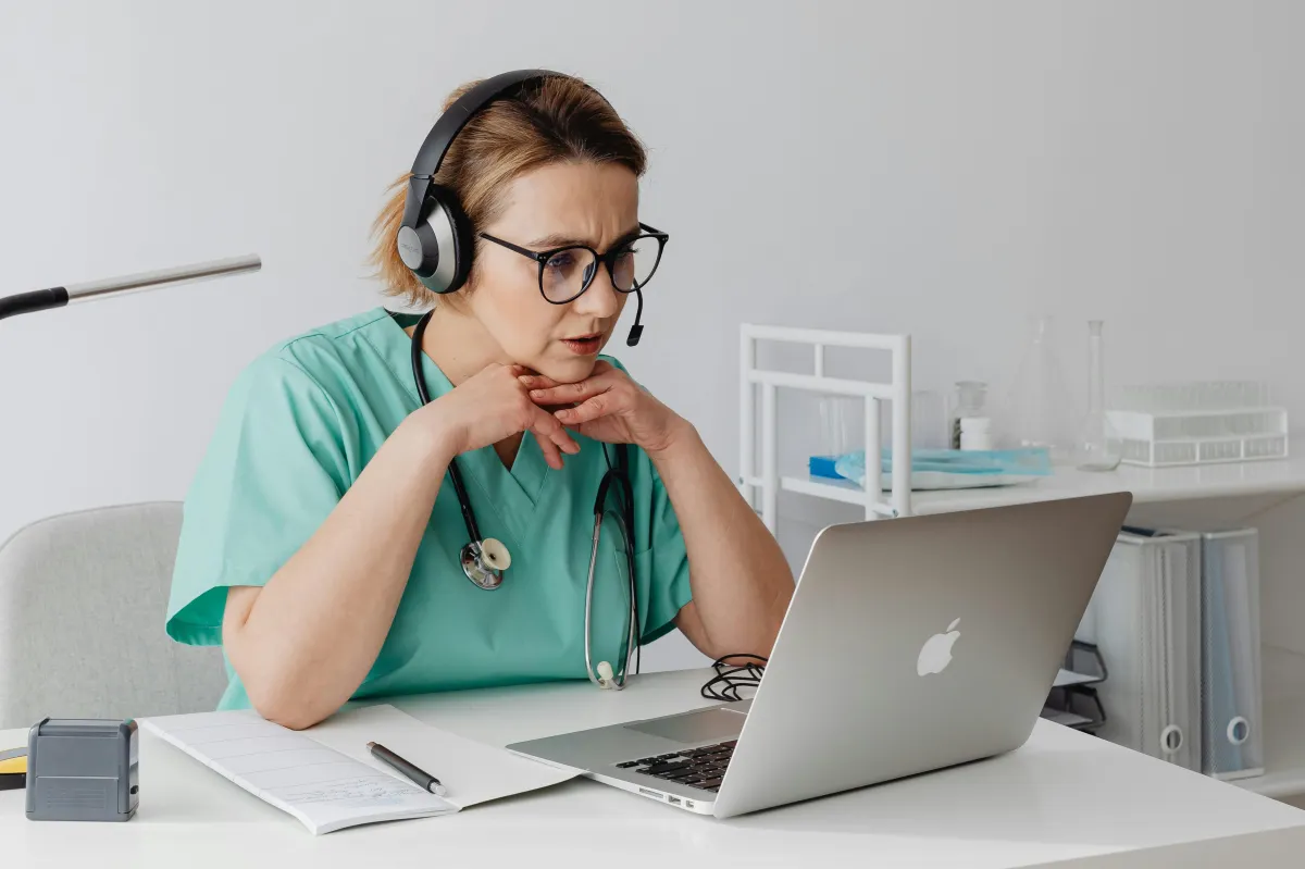 Dental practice leadership: A principal dentist sitting alone in a clinic surgery, reflecting on the mid-year reset and addressing operational drift.