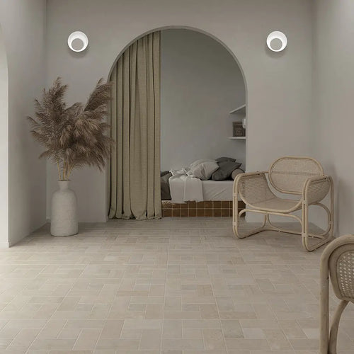 Architectural stone specialist tagging marble slabs directly at an Italian quarry
