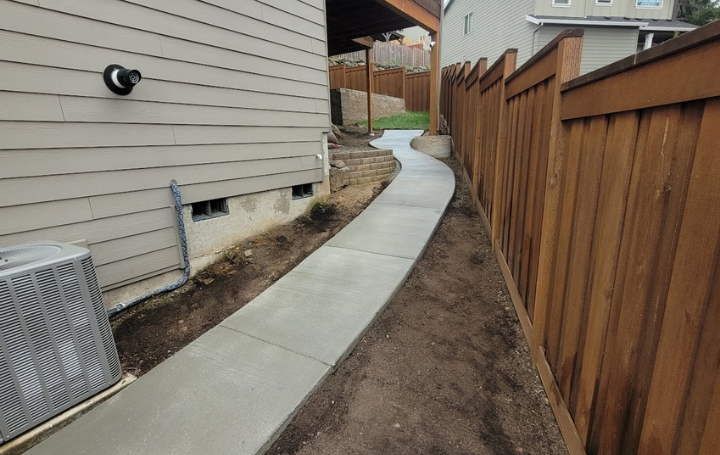 Manteca Concrete levels sidewalks.