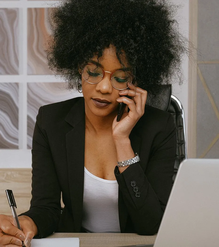 brown wooden framed yellow padded chair