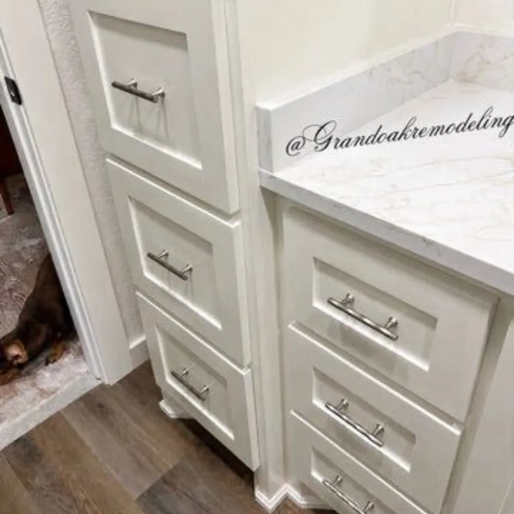 Contemporary kitchen upgrade with sleek cabinetry, stylish backsplash, and a spacious center island.