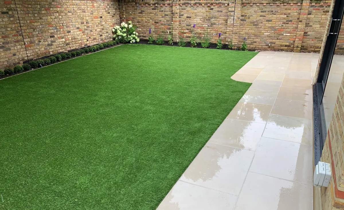 beige sawn sandstone patio installation in Teddington