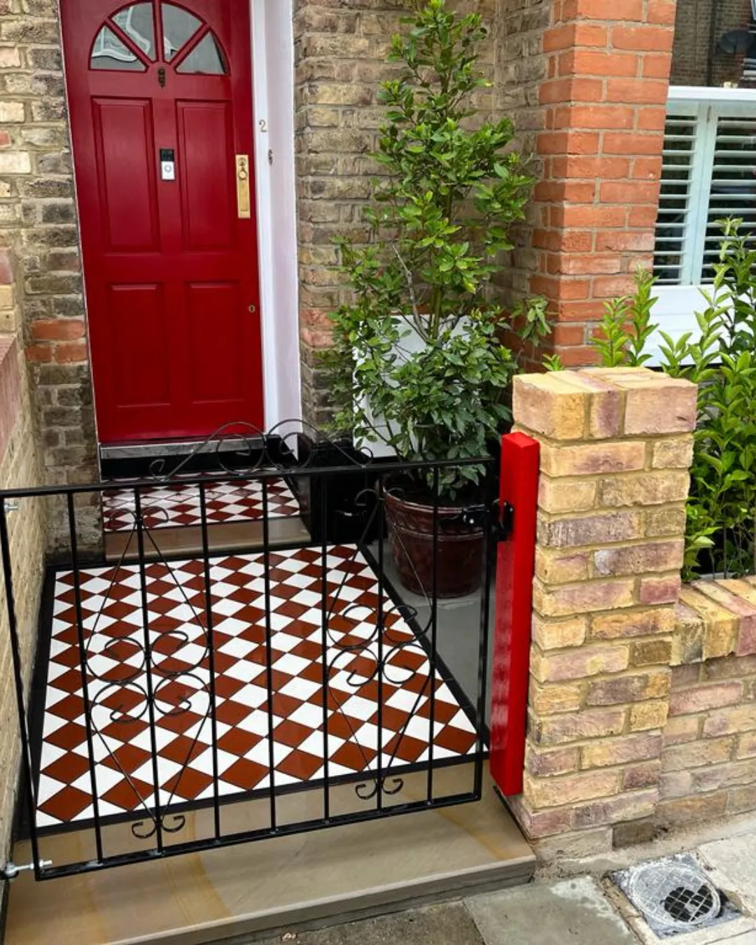 The patio is crafted from high-quality materials, creating a durable and stylish outdoor living space. Comfortable patio furniture is arranged on the smooth surface, inviting relaxation and social gatherings. Lush plants and vibrant flowers adorn the patio's edges, adding a touch of natural beauty and tranquility to the overall ambiance.