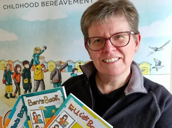 Image of Lorna Vyse, Child Bereavement Specialist with some of the books she has written to support children through grief