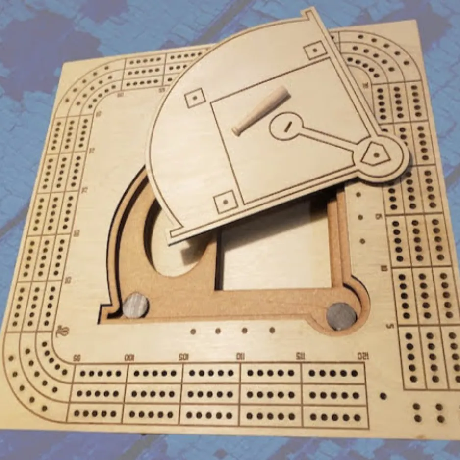 Custom laser-cut wooden baseball field cribbage board with a sliding storage compartment