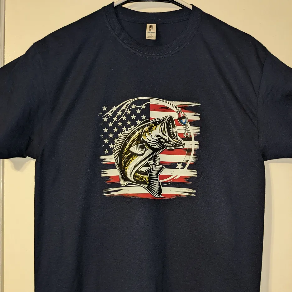 Stack of custom printed t-shirts for a Manchester NH local business event