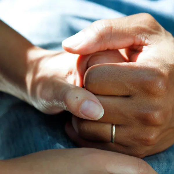 hands held with care