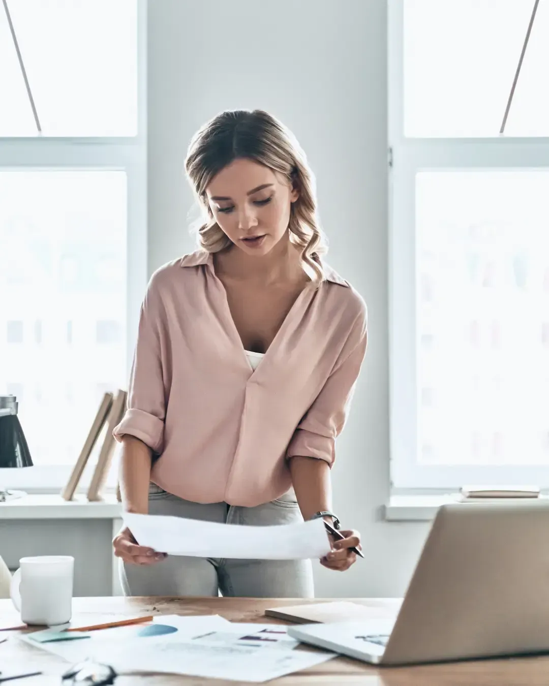 Billing specialist reviewing claims with attention to detail and accuracy