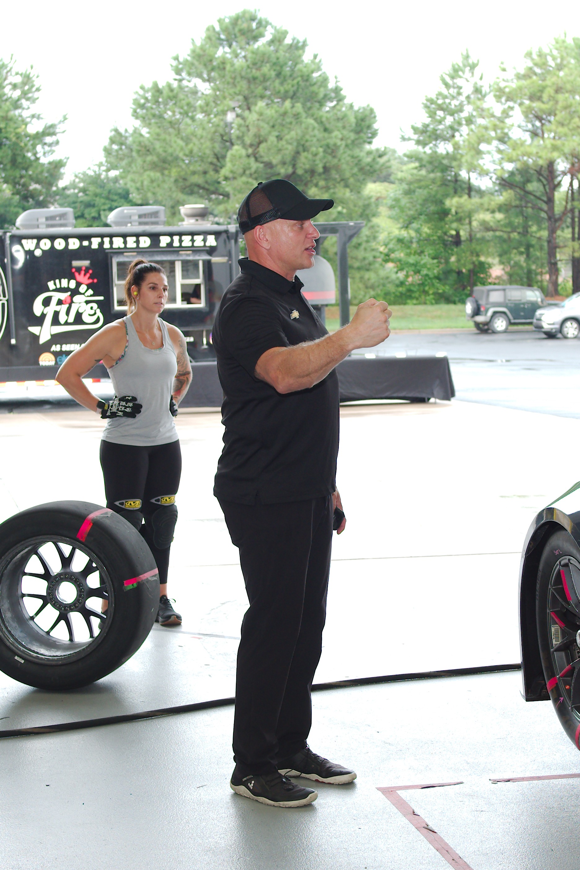 Shaun Peet demonstrating pit-crew techniques during a training session.