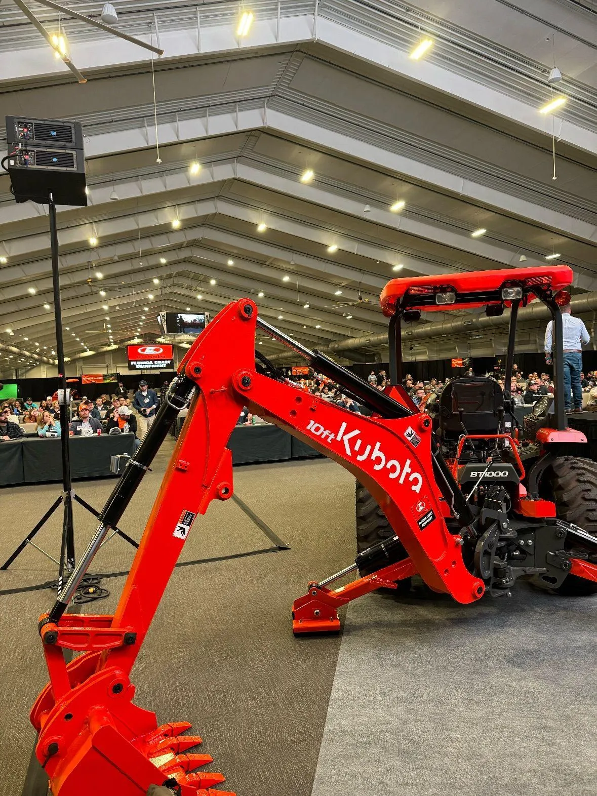 Shaun Peet speaking on stage at the Kubota National Convention in Florida, delivering a high-impact keynote on leadership, mindset, and performance in front of thousands of attendees.