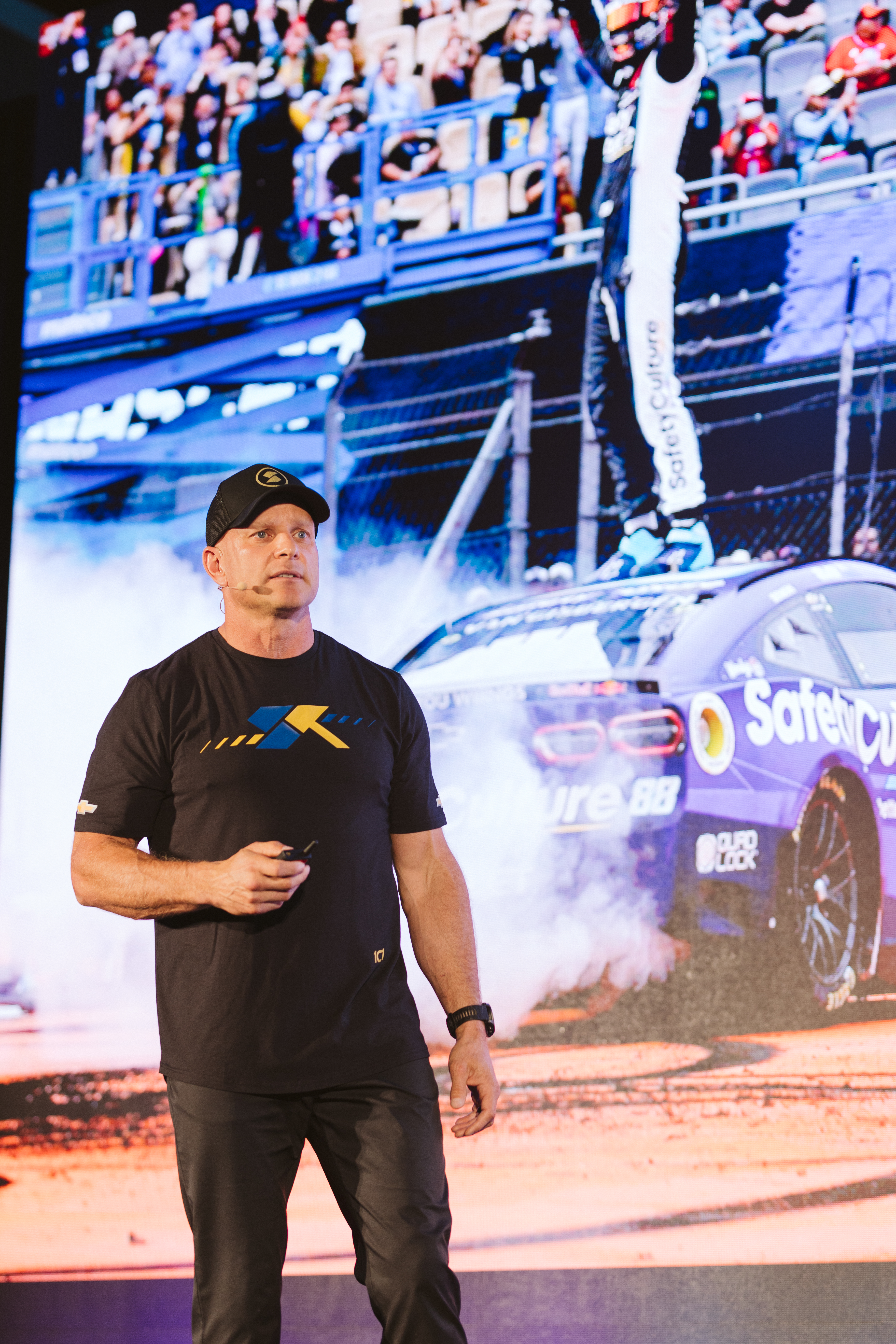 Shaun Peet demonstrating pit-crew techniques during a training session.