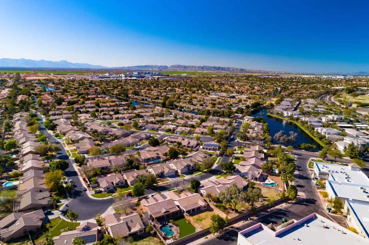 Aerial view of suburban neighborhood with houses.
