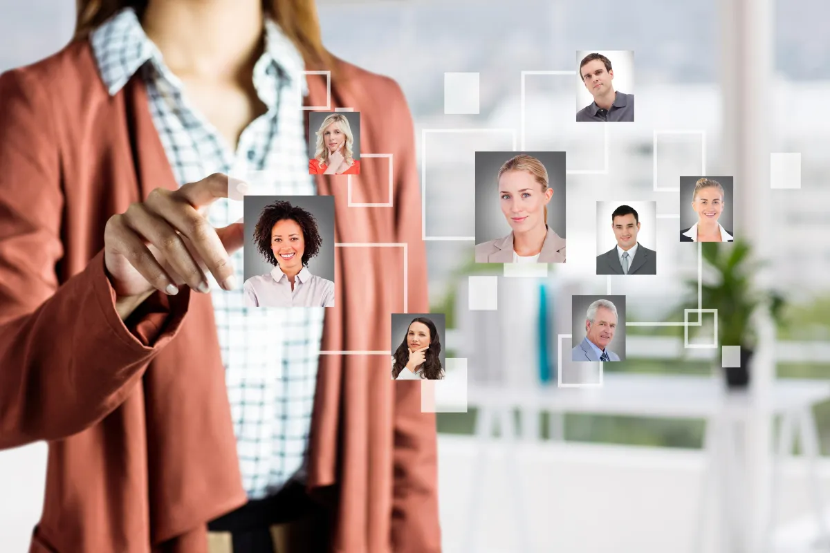 Person selecting profile photos on virtual screen.