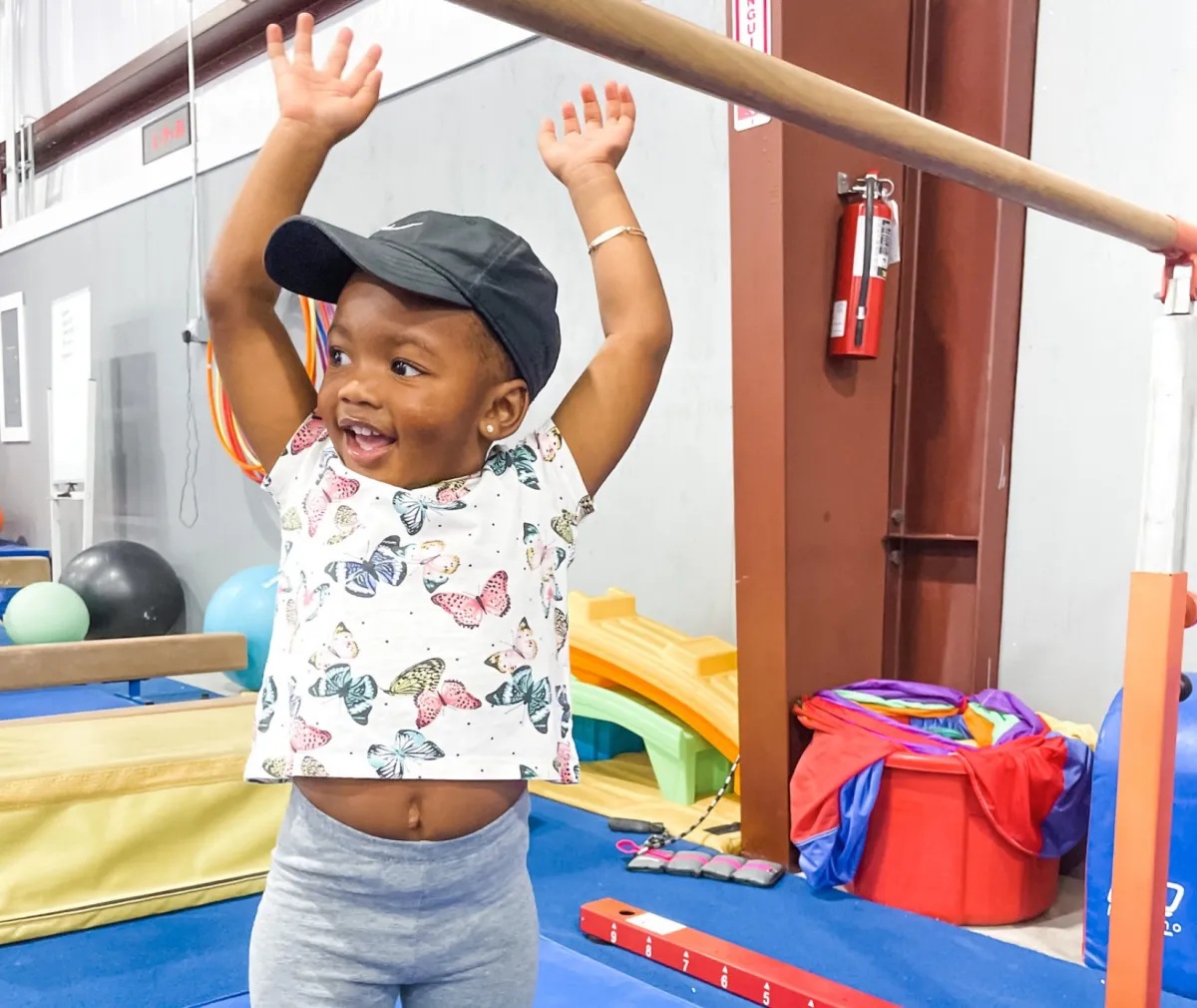 Young gymnast practicing Discovery Gymnastics