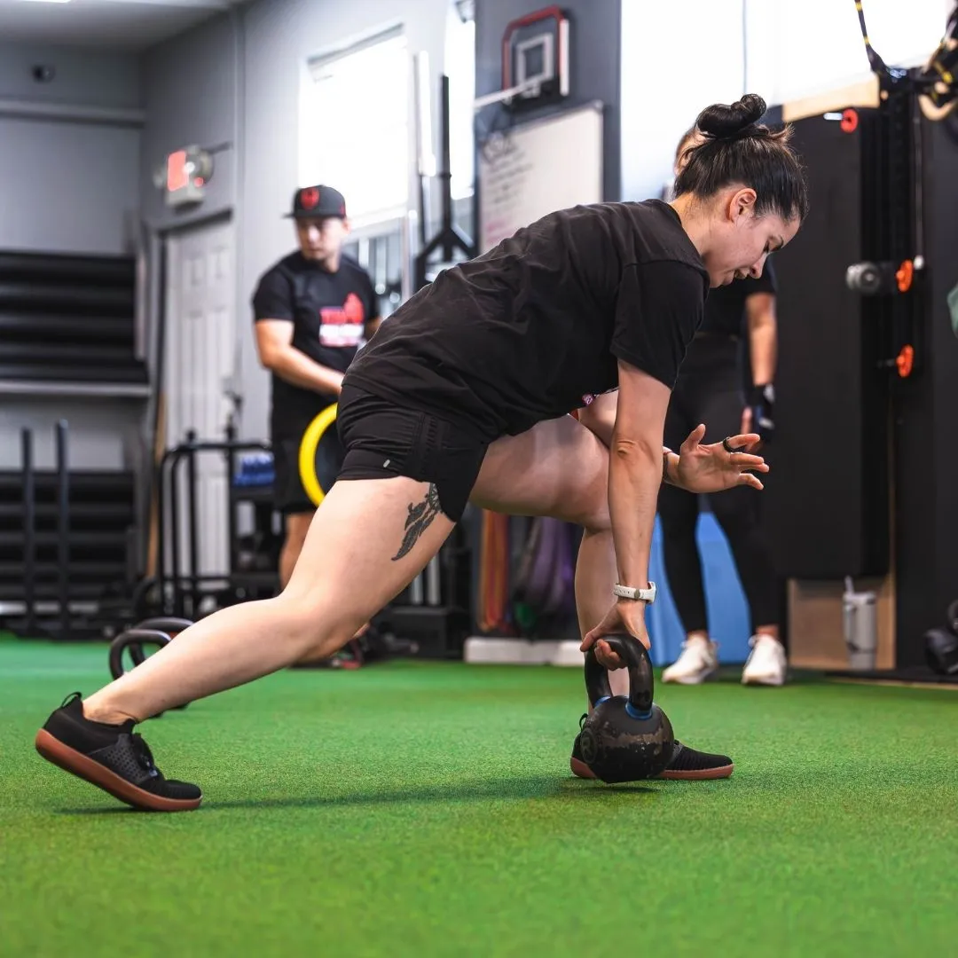 Person doing a Single Arm Row with a Kettlebell