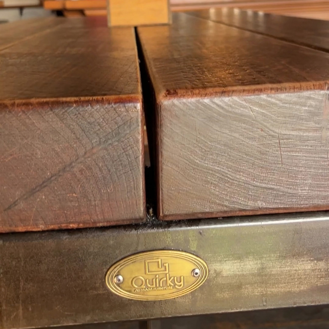 Close-up of golden natural macrocarpa timber grain with rich organic texture