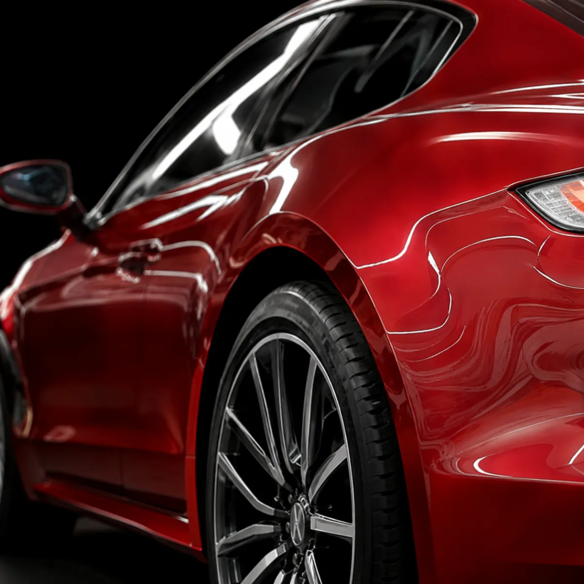 Red car with gloss vinyl wrap