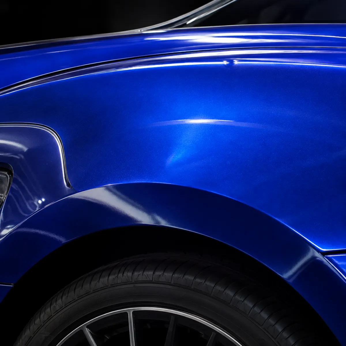 Blue car with metallic vinyl wrap