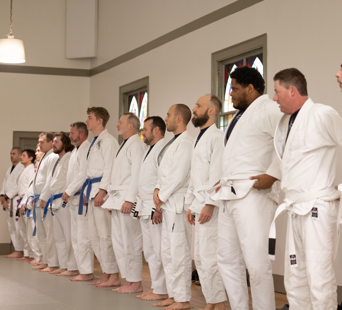 a group of people standing in a room
