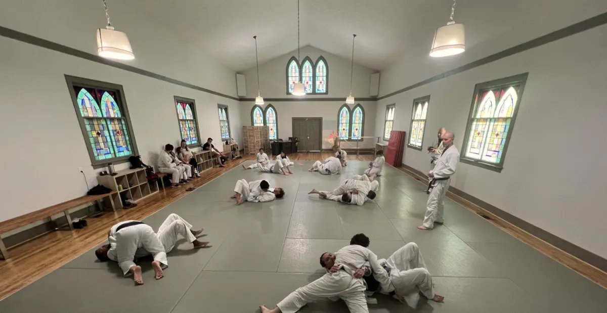 a group of people standing in a room