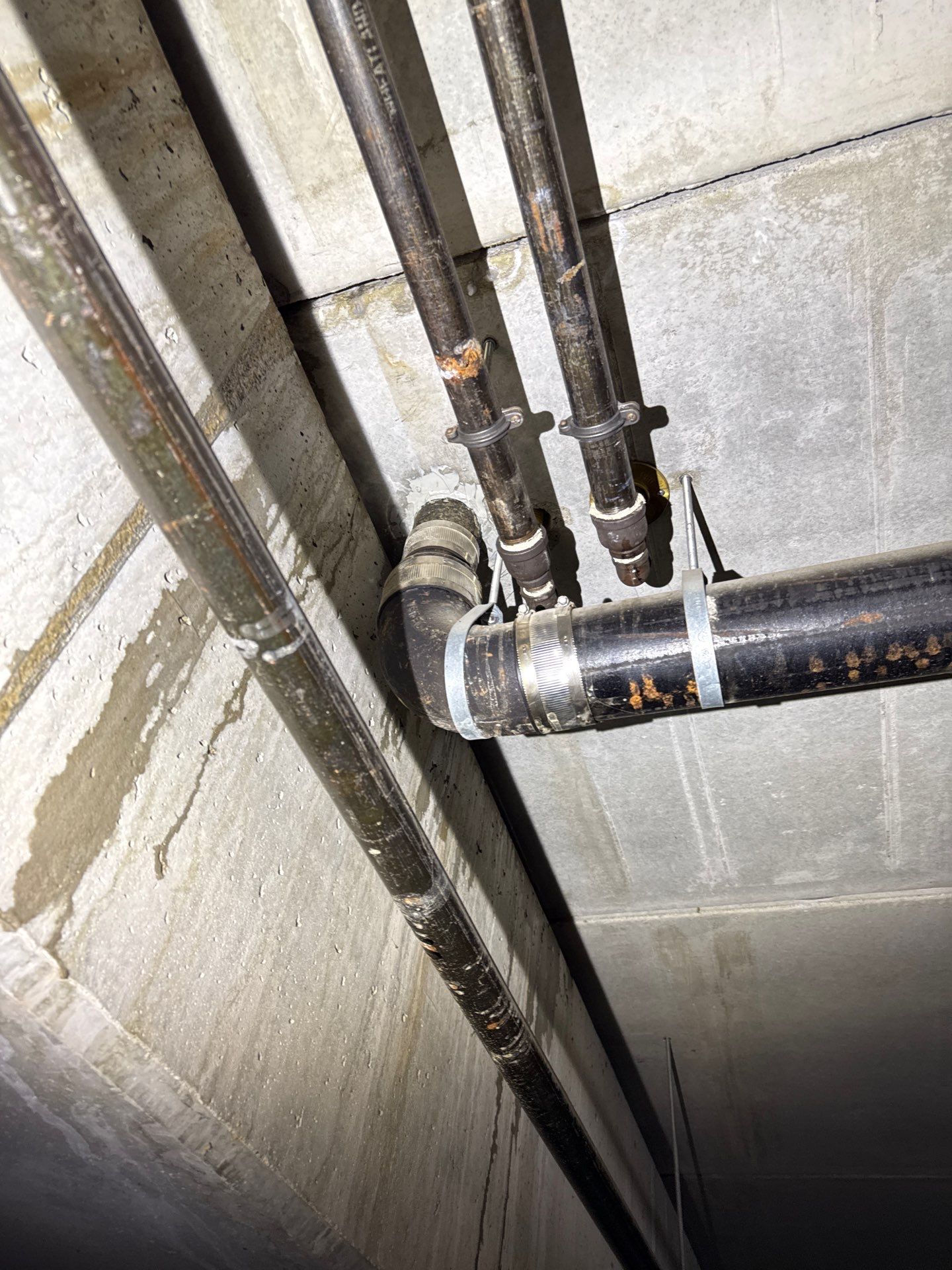 A Condominium Community Seeks Clarity on a Persistent Garage Leak in Clive, Iowa
