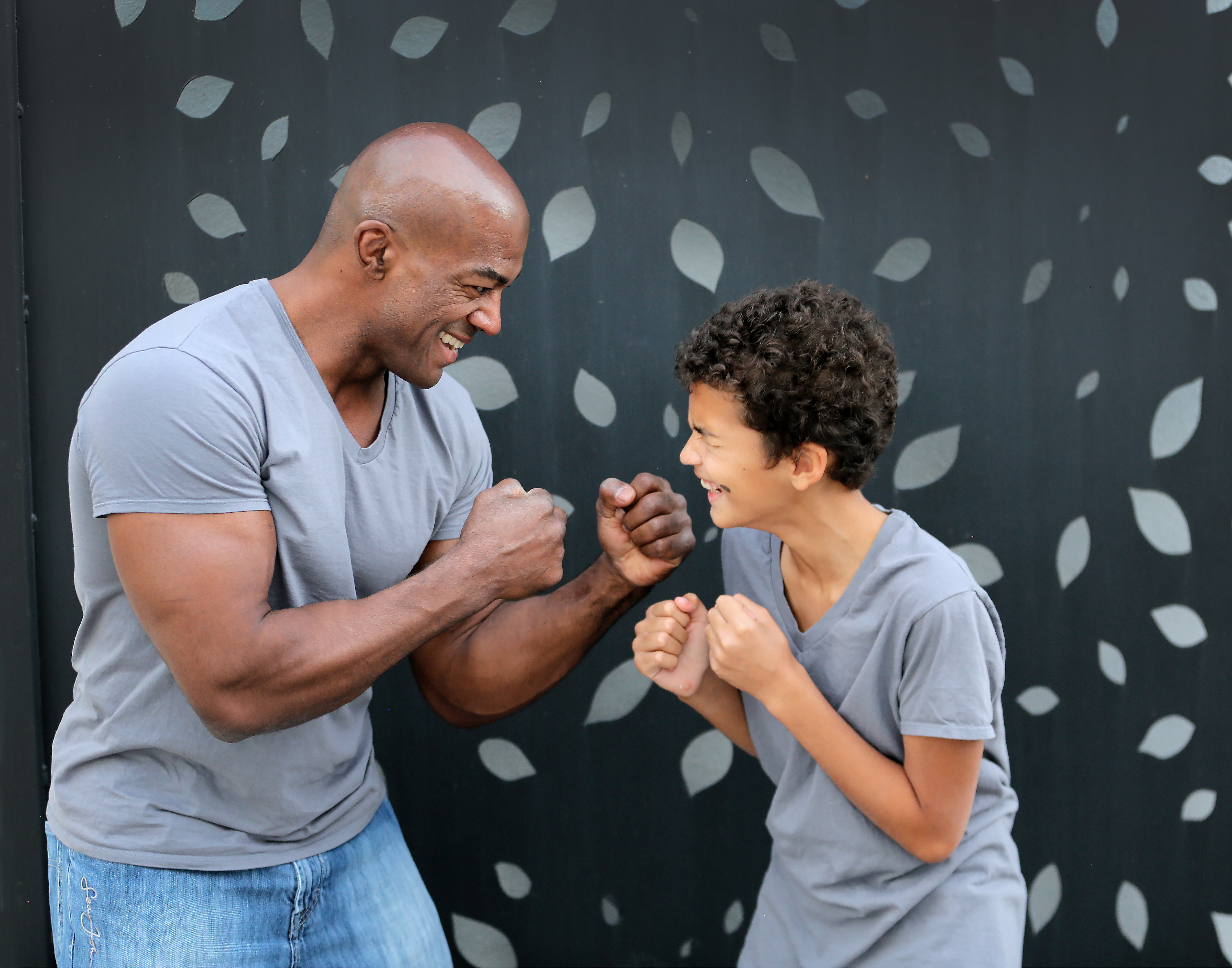 Dr. Carlson's husband and son play fighting