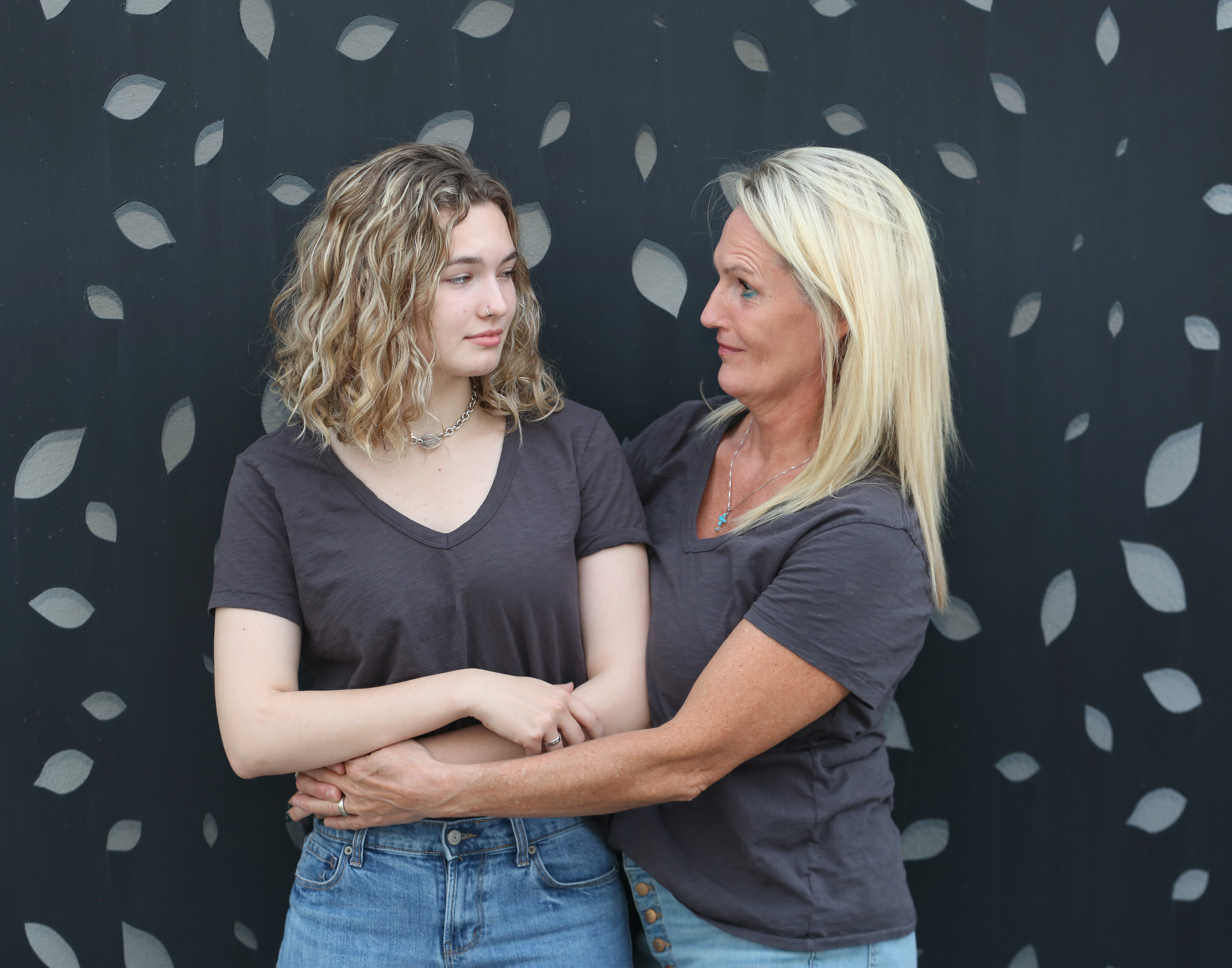 Dr. Carlson and oldest daughter making faces at each other