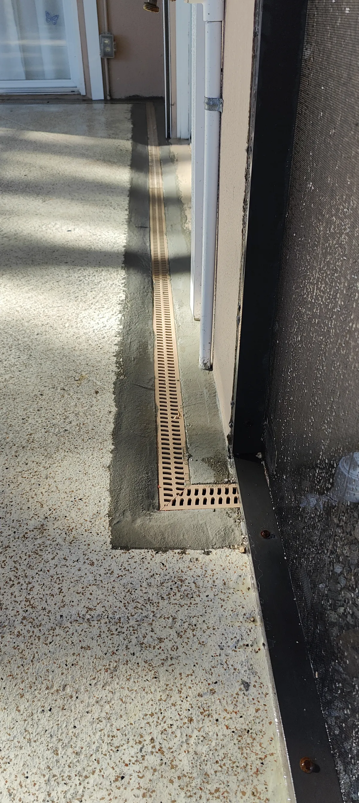 Channel drain set into concrete