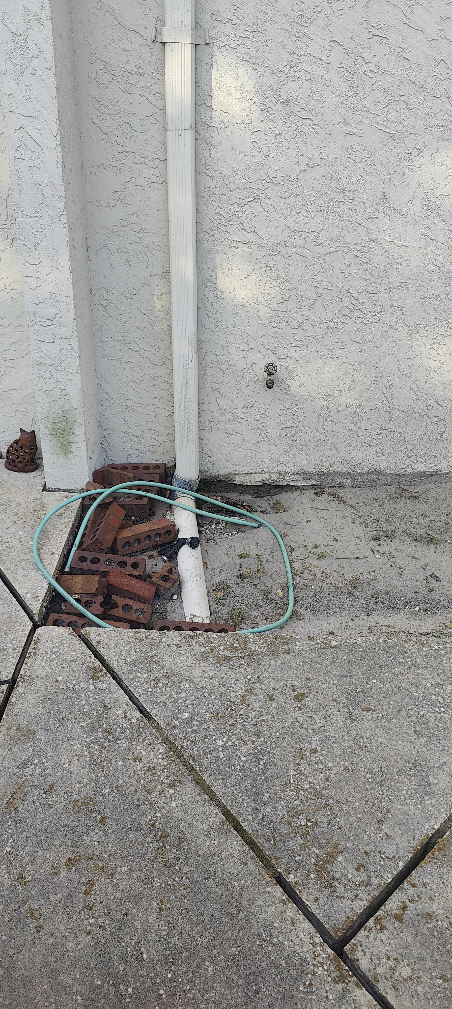 What a Proper Downspout Connection Looks Like