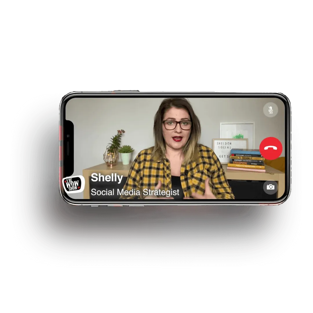 Shelly Terry, Social Media Strategist and founder of Sheldon Social, speaking on The Wow Show — displayed as a video call mockup on a mobile phone screen."
