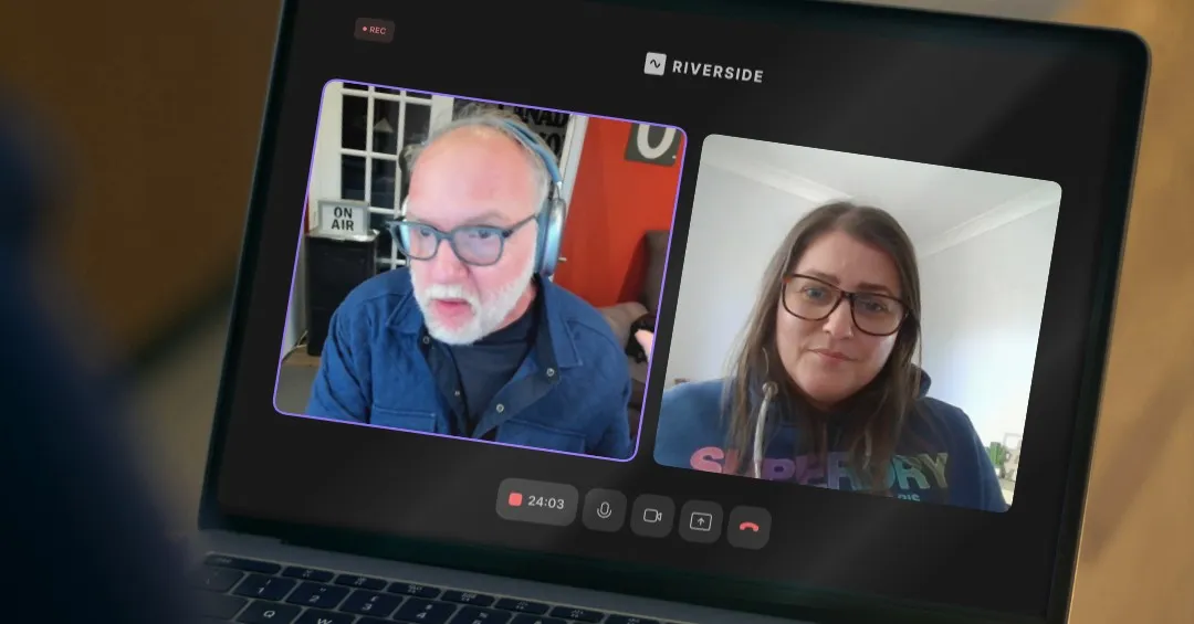 Laptop screen showing a Riverside.fm recording session with two participants side by side- Jason Thomson on the left wearing headphones and a blue denim shirt in a home studio with an "On Air" sign, and Shelly Terry on the right wearing a Superdry hoodie in a plain room- with a recording timer showing 24:03.