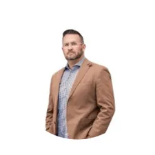 Justin Baker Headshot - Director of Coaching - Coach Pipes