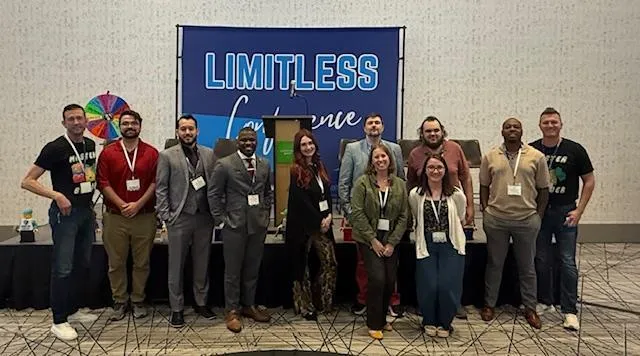Steven Brown in group photo at Limitless Conference