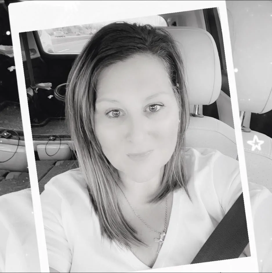 Headshot avatar of a smiling 30-something woman