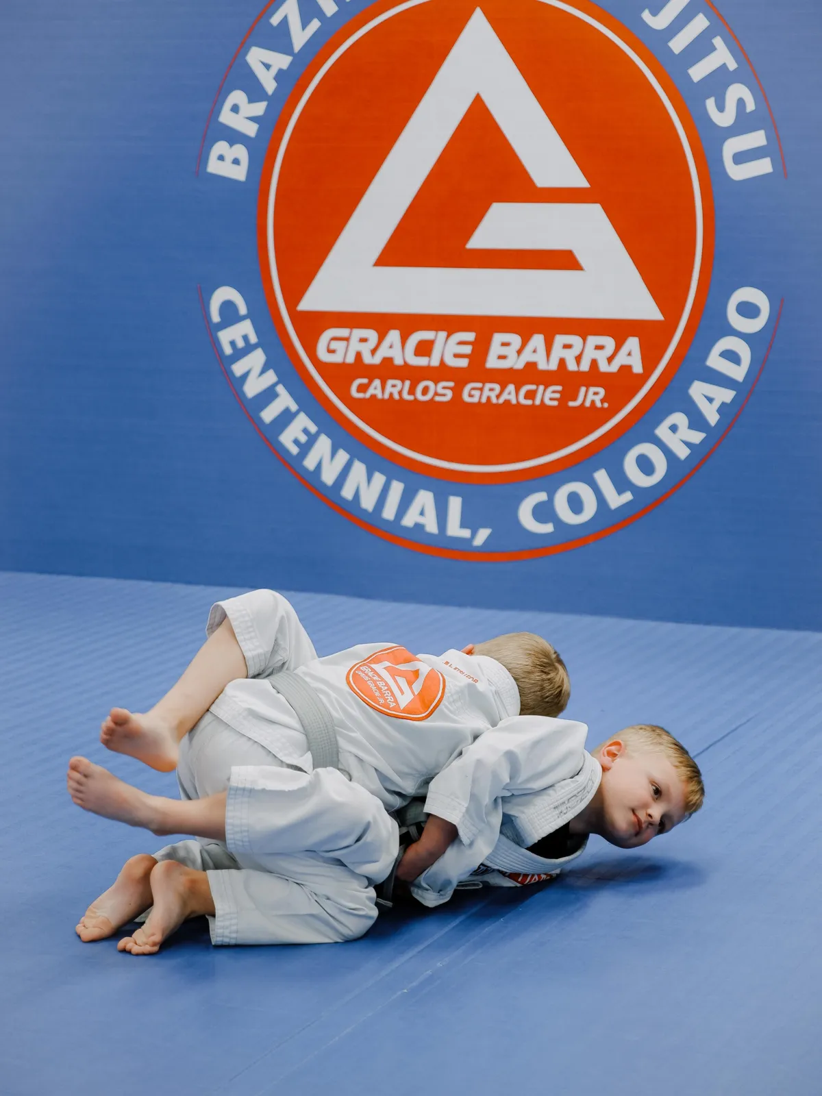 a man is doing yoga in a living room