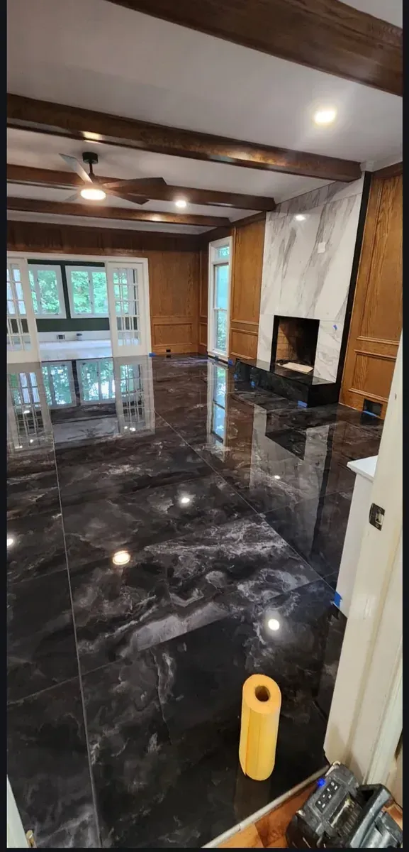Polished marble great room floor and matching fireplace surround, Dunwoody