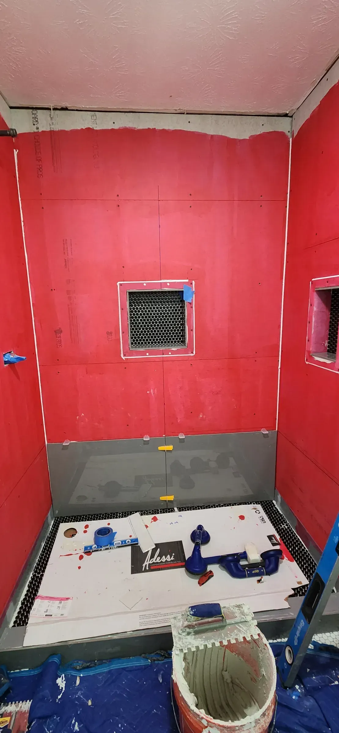 Waterproofing before tile. Every surface that will meet water, sealed and banded