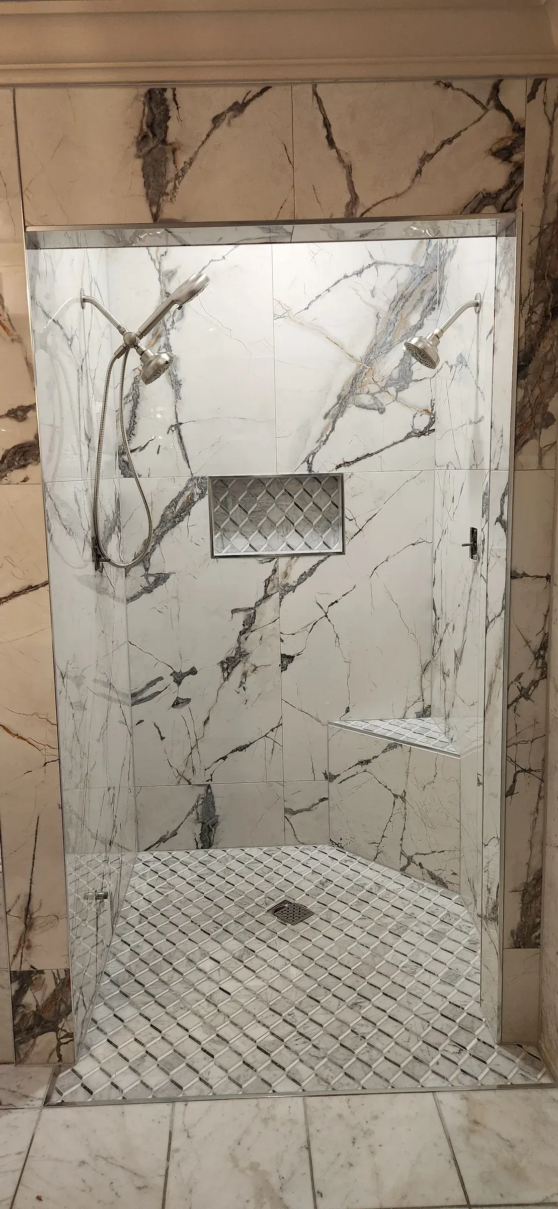 Rebuilt Buckhead condo shower, tile blended to existing